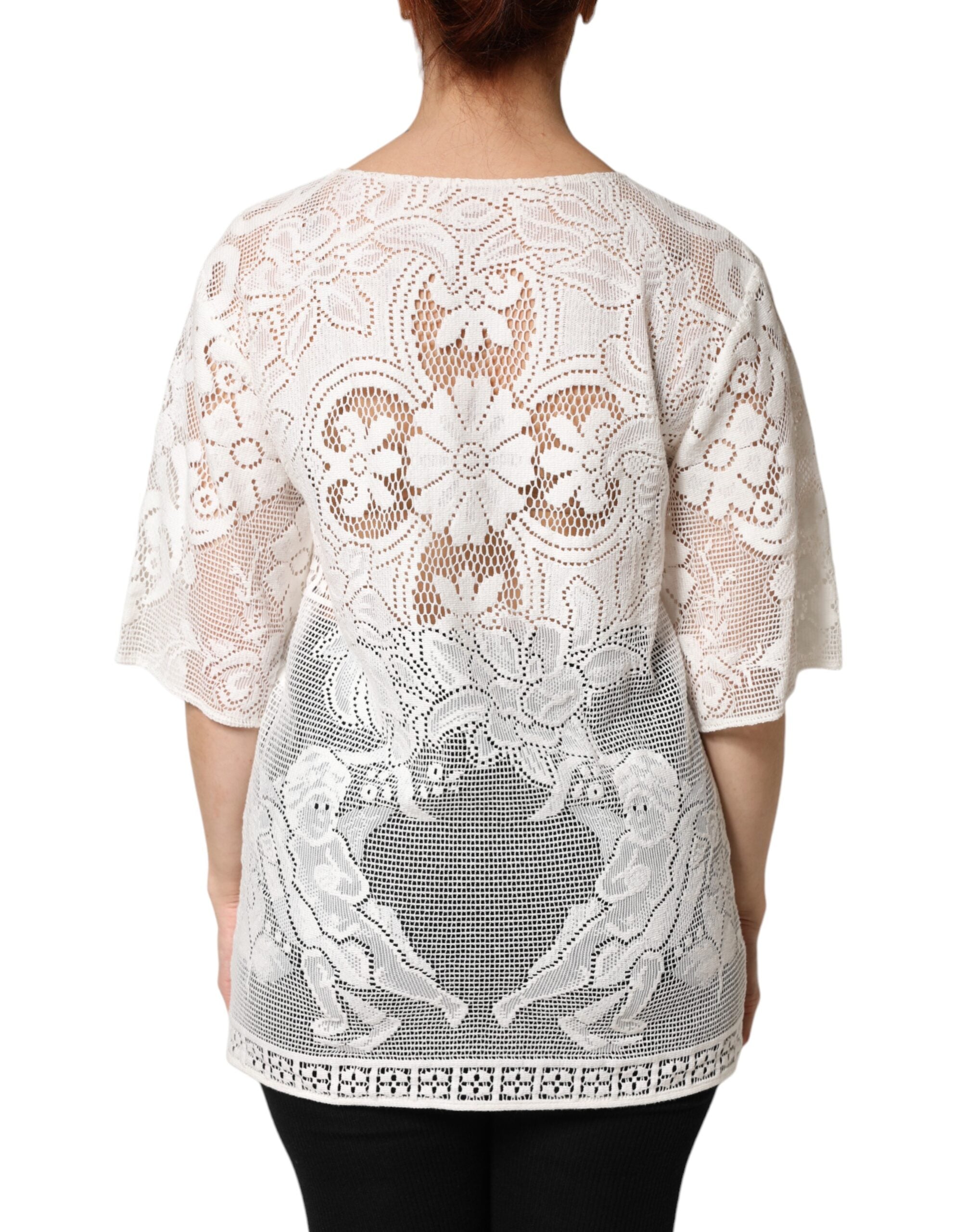 Blouse en coton blanc avec broderie en dentelle Dolce & Gabbana, haut féminin élégant et délicat.