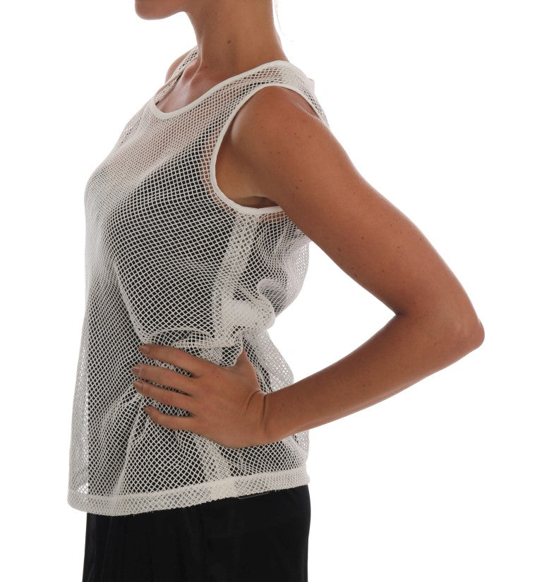 Top blanc en filet transparent de Dolce & Gabbana, sans manches, avec détails élégants pour un look sophistiqué.