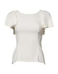 Blouse blanche Dolce & Gabbana à col rond et manches courtes, vue de face, en tissu léger.