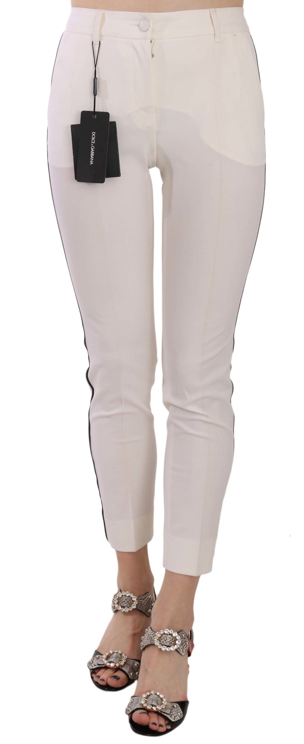 Pantalons slim cropped blancs Dolce & Gabbana avec une bande latérale, élégants et tendance pour un style moderne.