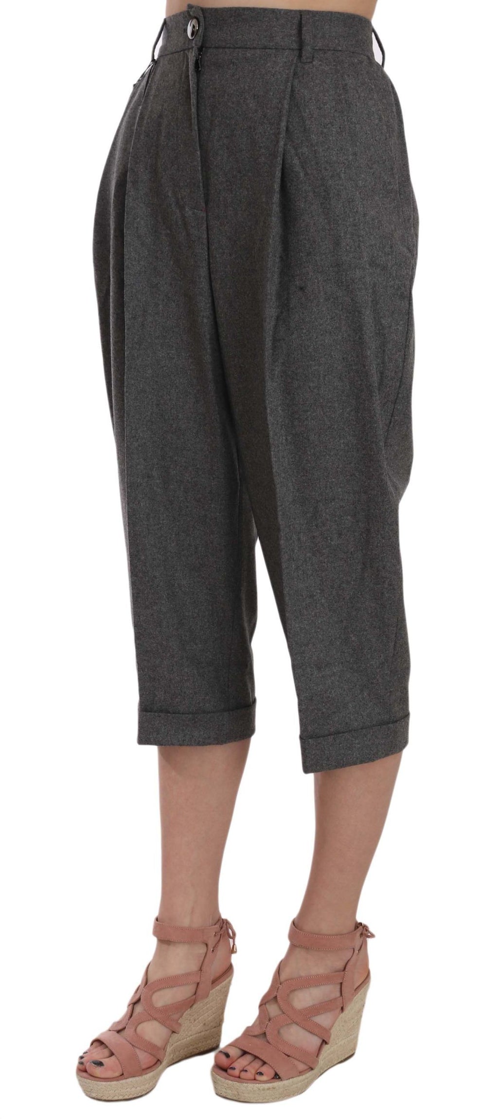 Pantalon court en laine Dolce & Gabbana avec plis, coupe cropped, style élégant et sophistiqué, visible en gros plan.