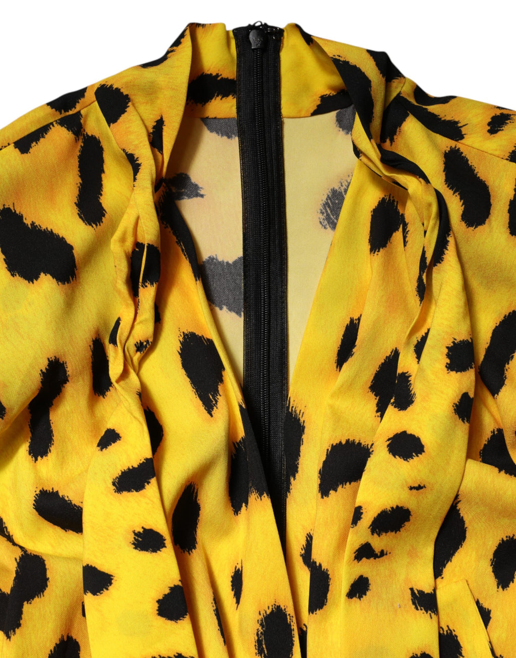 Combinaison longue à manches longues Dolce & Gabbana à motif léopard jaune, style élégant et tendance.
