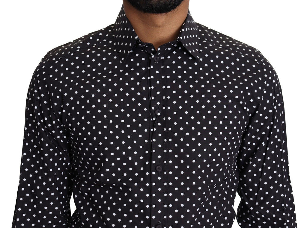 Chemise décontractée Dolce & Gabbana à pois noirs et blancs, style casual, en tissu léger, visible dans l'image.