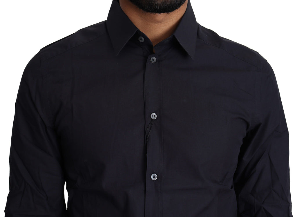 Chemise formelle en coton bleu marine Dolce & Gabbana, vue détaillée du tissu et du col sur fond neutre.