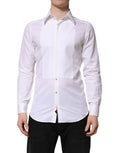 Chemise blanche en coton Dolce & Gabbana à manches longues avec détails en or, vue de l'avant sur un mannequin.