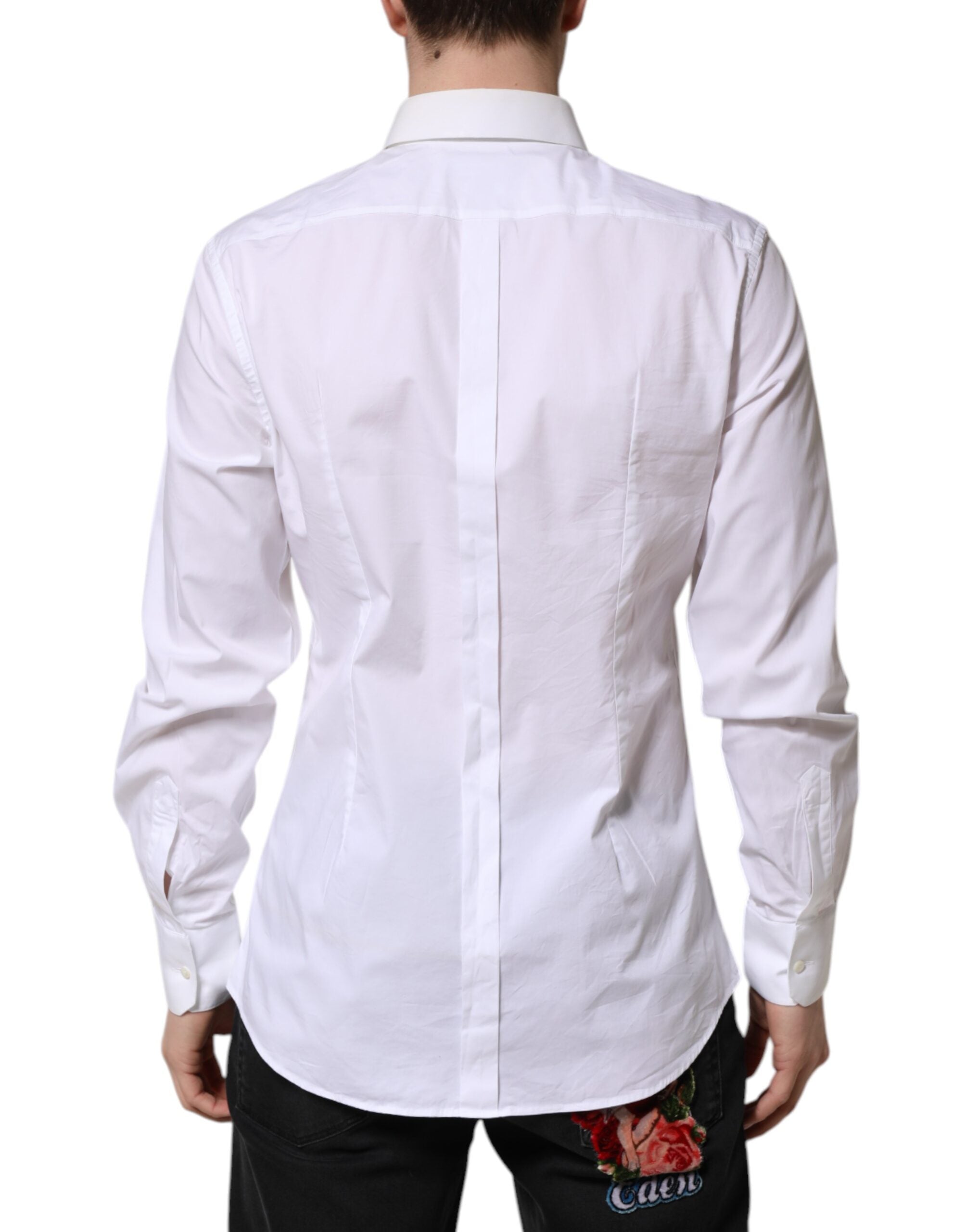 Chemise blanche en coton à manches longues de Dolce & Gabbana, style élégant avec détails dorés.