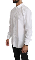 Chemise blanche en coton à manches longues de Dolce & Gabbana, visible avec col classique et coupe élégante.