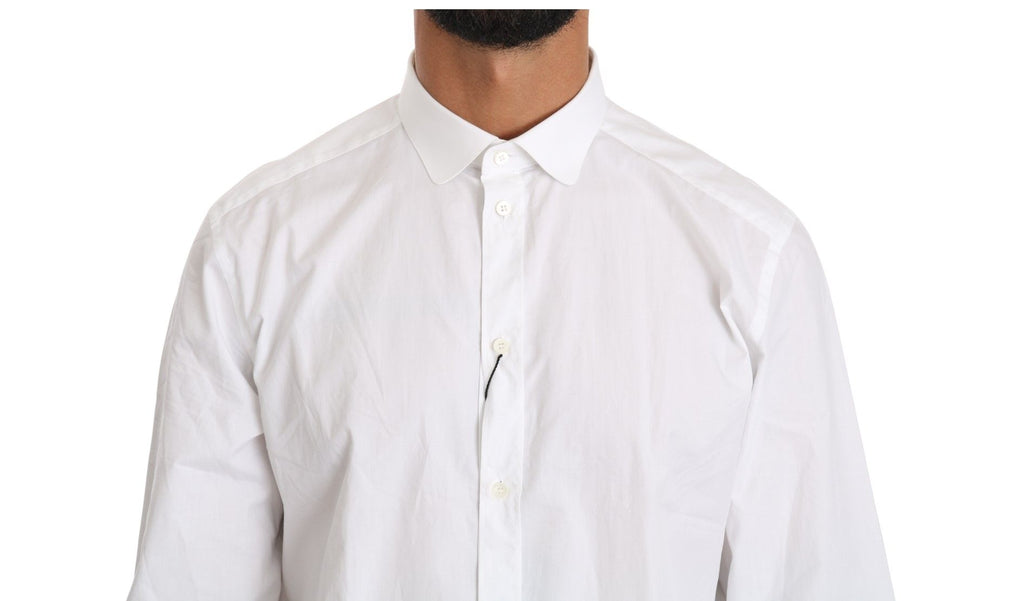 Chemise blanche en coton à manches longues de Dolce & Gabbana, vue de face avec col classique et détails élégants.