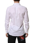 Chemise blanche en coton à manches longues de Dolce & Gabbana, vêtement formel élégant avec détail de couture sophistiqué.