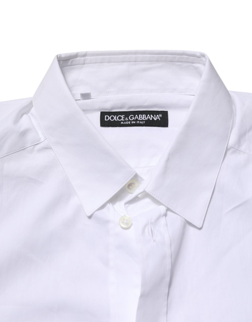 Chemise blanche en coton à manches longues de la marque Dolce & Gabbana, vêtement formel élégant et sophistiqué.
