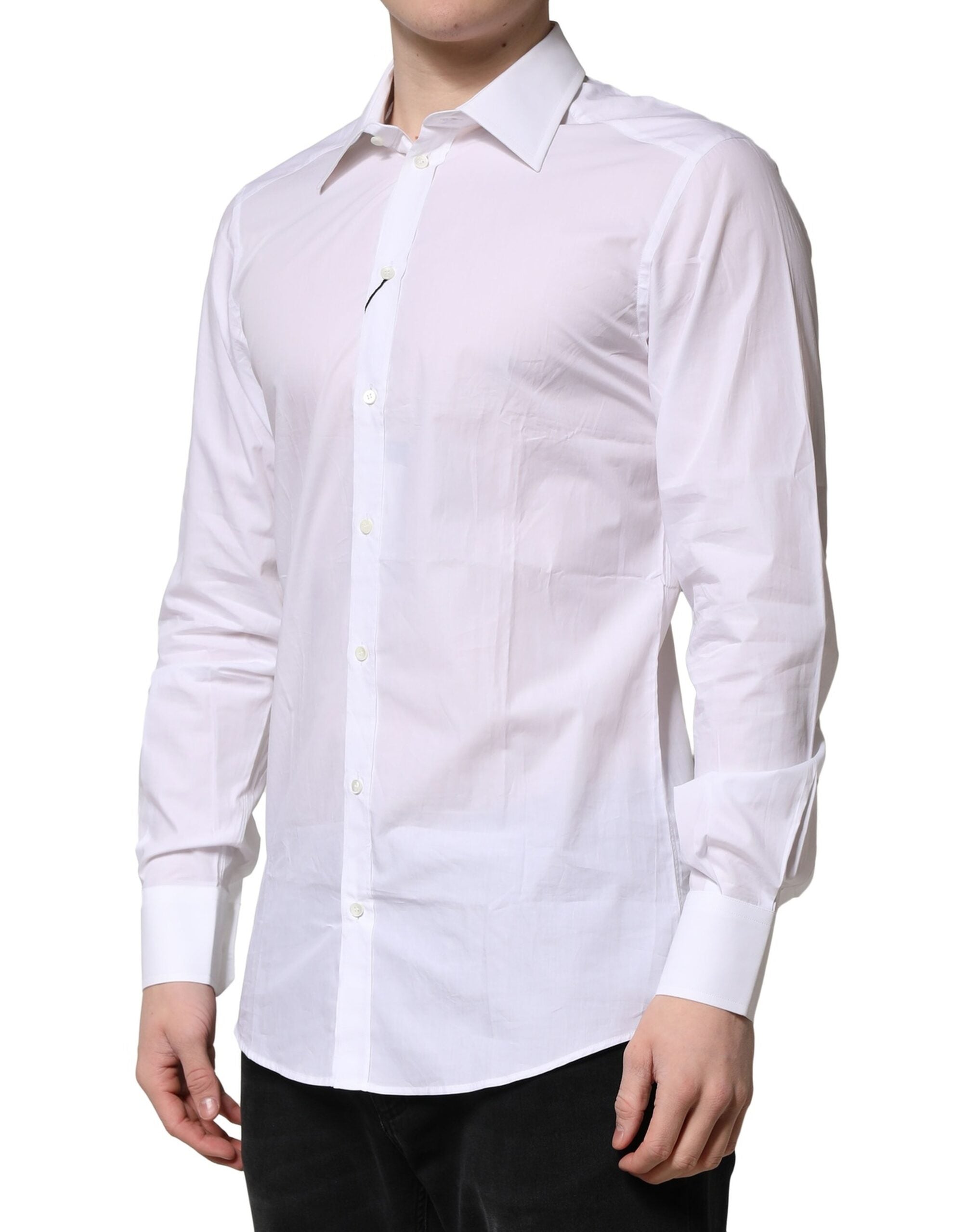 Chemise blanche en coton à manches longues Dolce & Gabbana, style formel avec détails dorés visibles sur l'image.