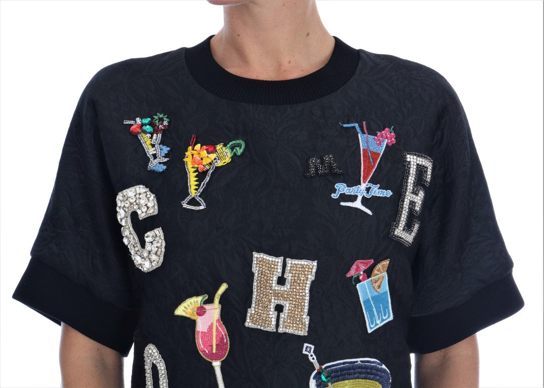Pull en maille cocktail noir Dolce & Gabbana en brocart brodé de cristaux, élégant et sophistiqué.