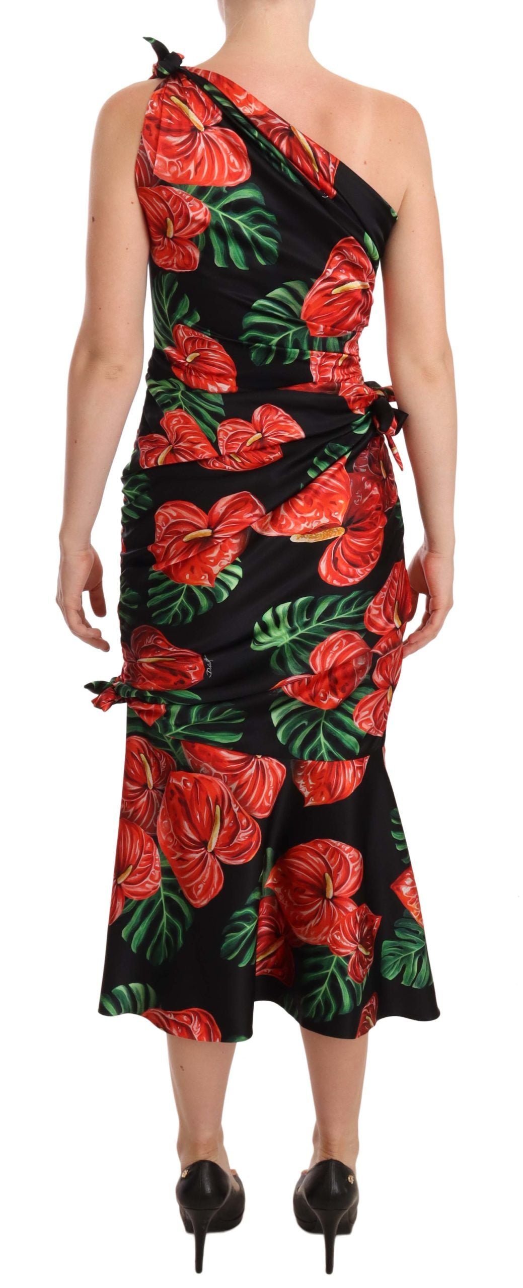 Robe noire en soie brillante Dolce & Gabbana avec imprimé floral, coupe drapée élégante, pour femme.