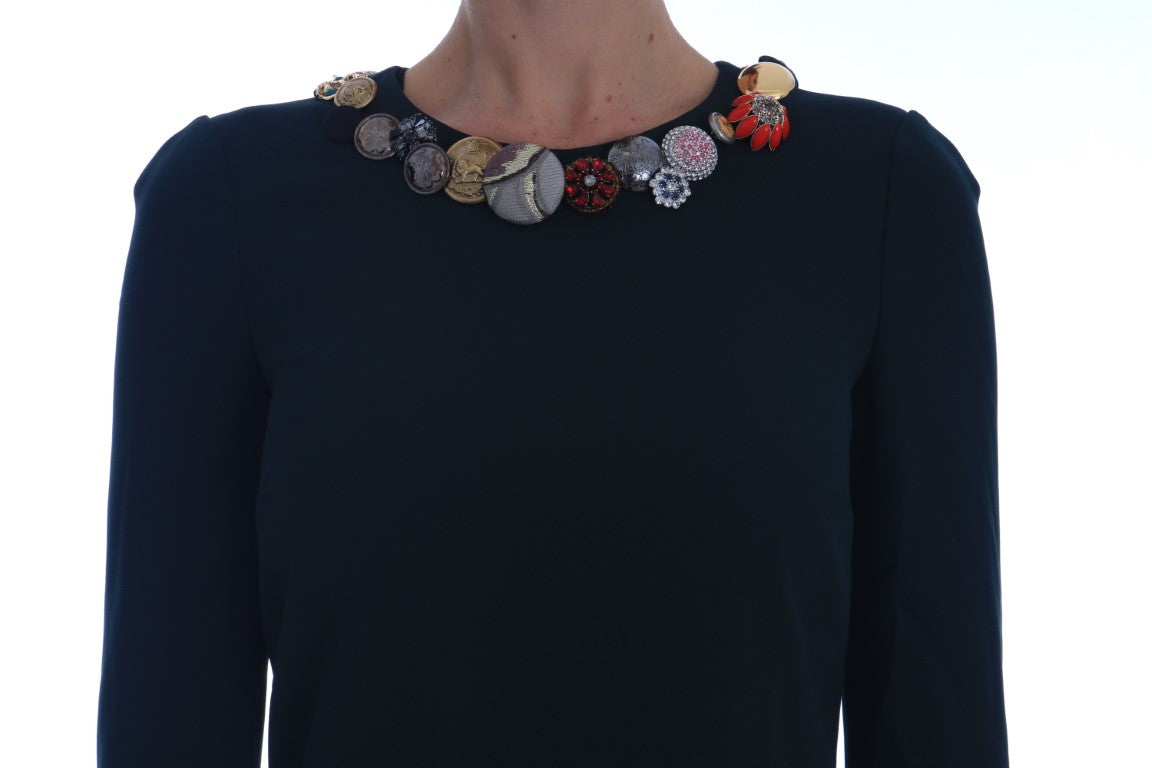 Robe courte verte en stretch avec cristaux de Dolce & Gabbana, coupe en ligne A, détail élégant et sophistiqué.