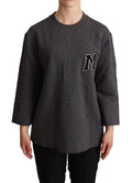 Pull-over gris pour femmes Dolce & Gabbana avec broderies élégantes, en maille douce et confortable.
