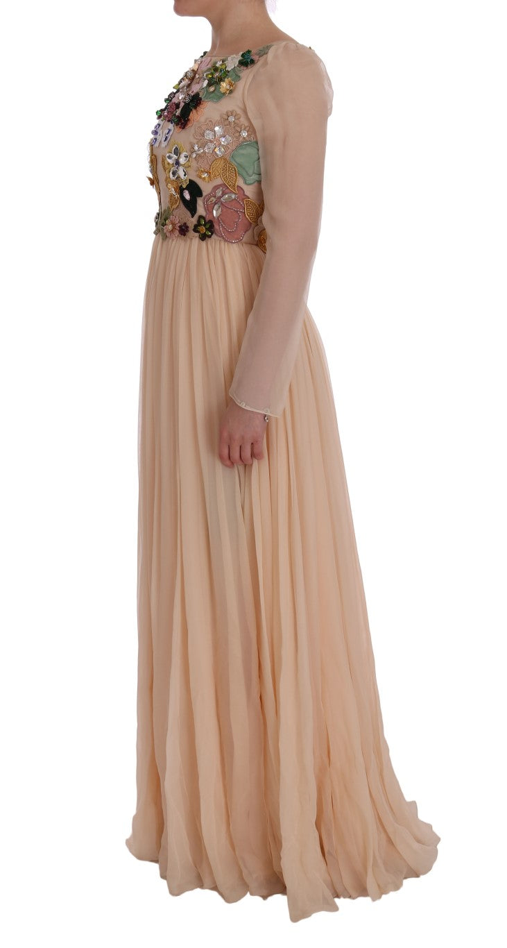 Robe longue en soie rose Dolce & Gabbana avec motifs floraux et cristaux, élégante et fluide, pour une occasion spéciale.