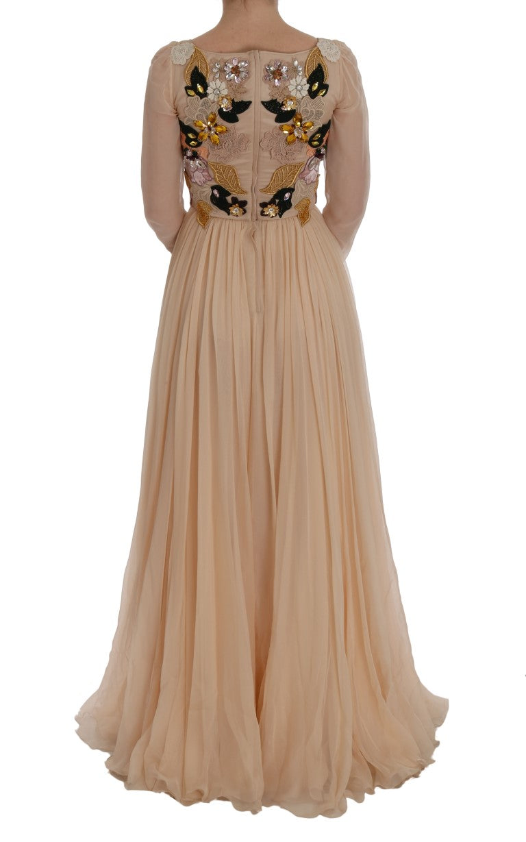 Robe longue en soie rose Dolce & Gabbana avec motifs floraux et cristaux, élégante et sophistiquée.