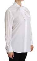 Chemise polo à manches longues blanche Dolce & Gabbana avec col roulé, en tissu doux et élégant.