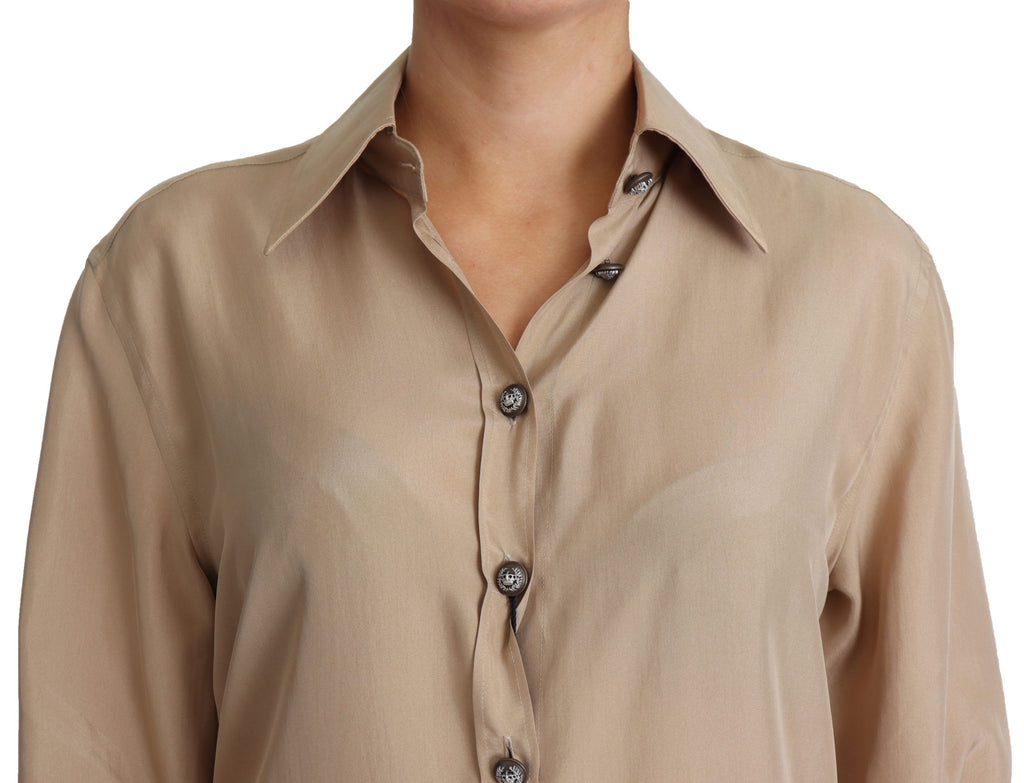 Chemise en soie beige Dolce & Gabbana avec boutons décoratifs, vue de face sur un fond neutre.
