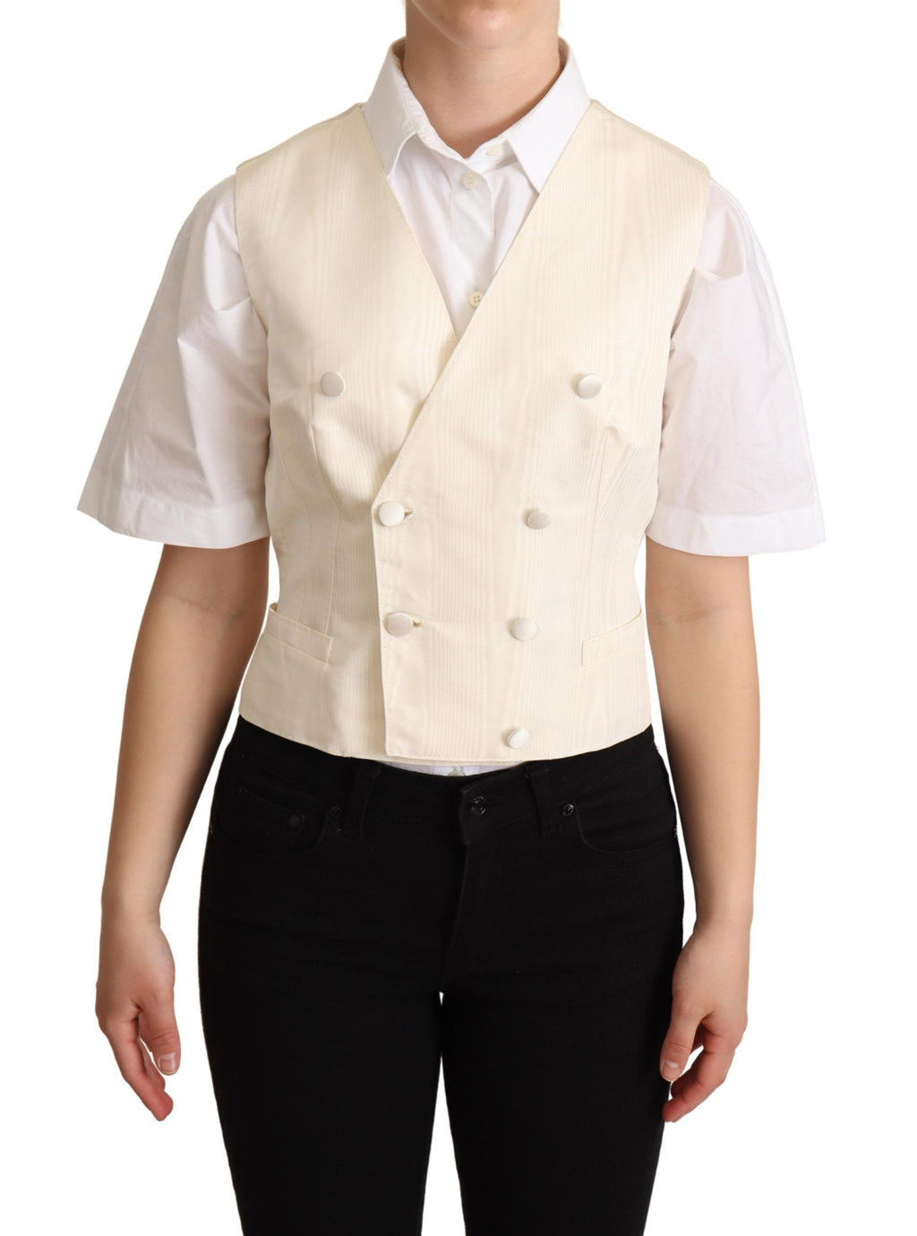 Gilet sans manches en soie beige de Dolce & Gabbana, ajusté à la taille, avec un style élégant et sophistiqué.