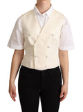Gilet sans manches en soie beige de Dolce & Gabbana, ajusté à la taille, avec un style élégant et sophistiqué.
