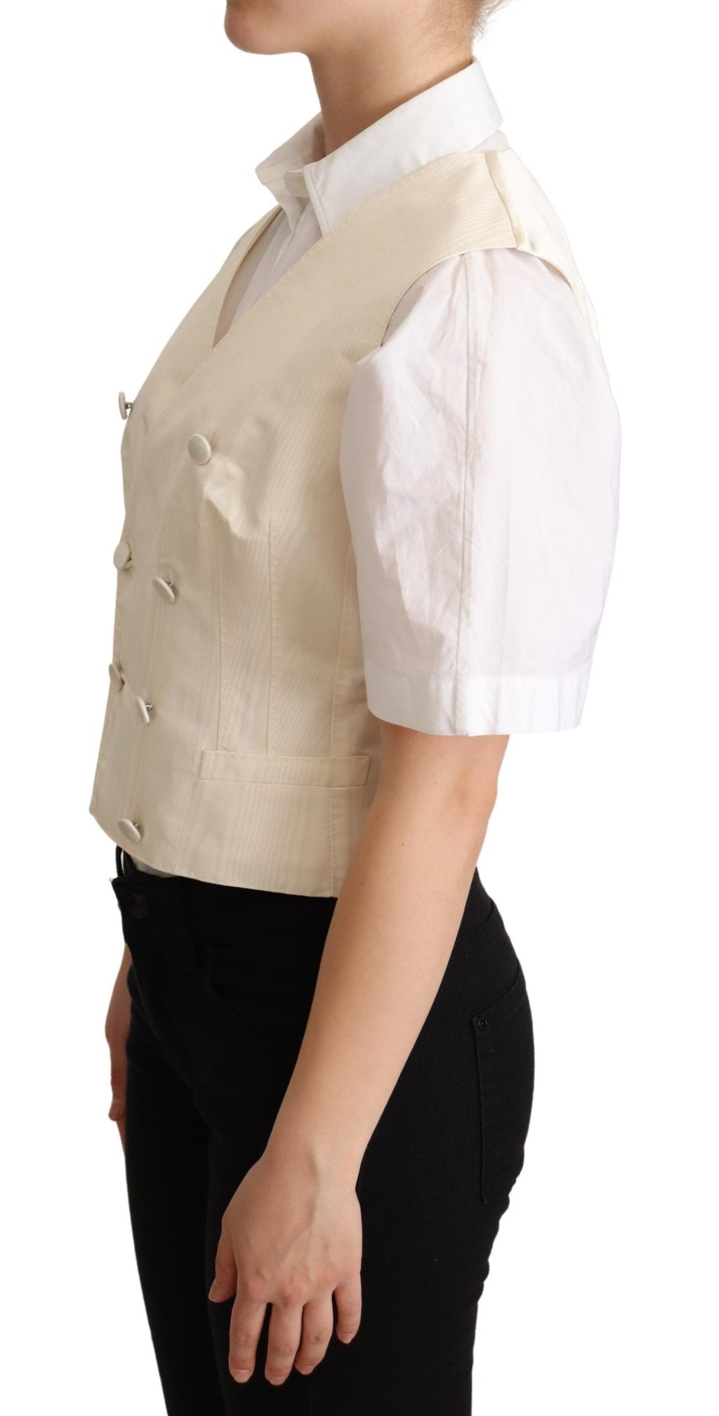 Gilet sans manches en soie beige de Dolce & Gabbana, veste élégante à la taille, détail sophistiqué et tissu luxueux.