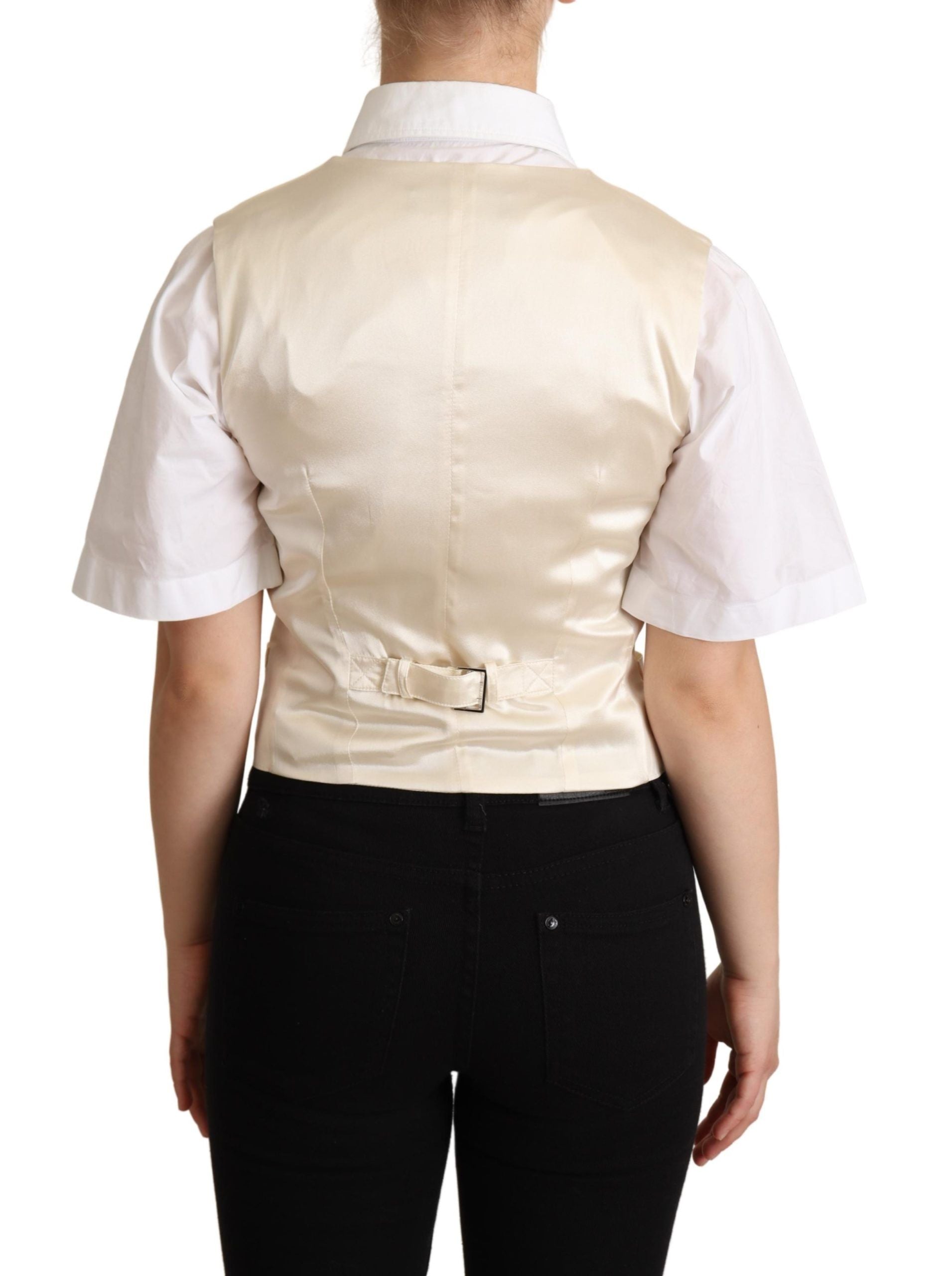 Gilet sans manches en soie beige de Dolce & Gabbana, veste cintrée élégante pour femme, vue de face.