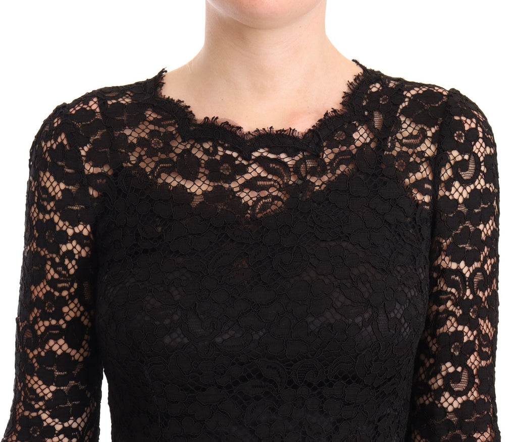 Robe longue sirène en coton noir avec dentelle et manches longues, signée Dolce & Gabbana.