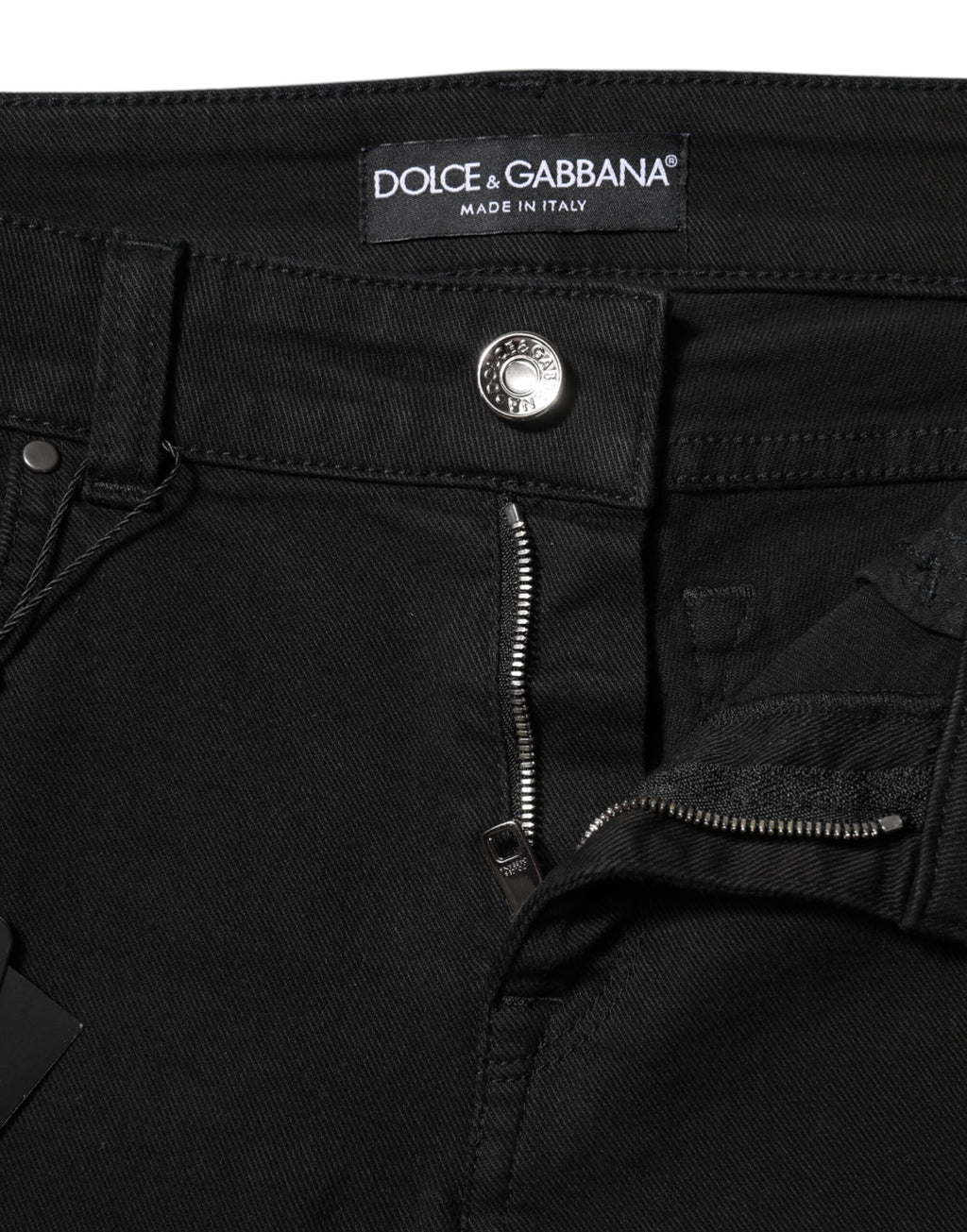 Jeans skinny noirs Dolce & Gabbana en coton avec logo, coupe mi-hauteur et taille mi, visibles avec détails de couture.