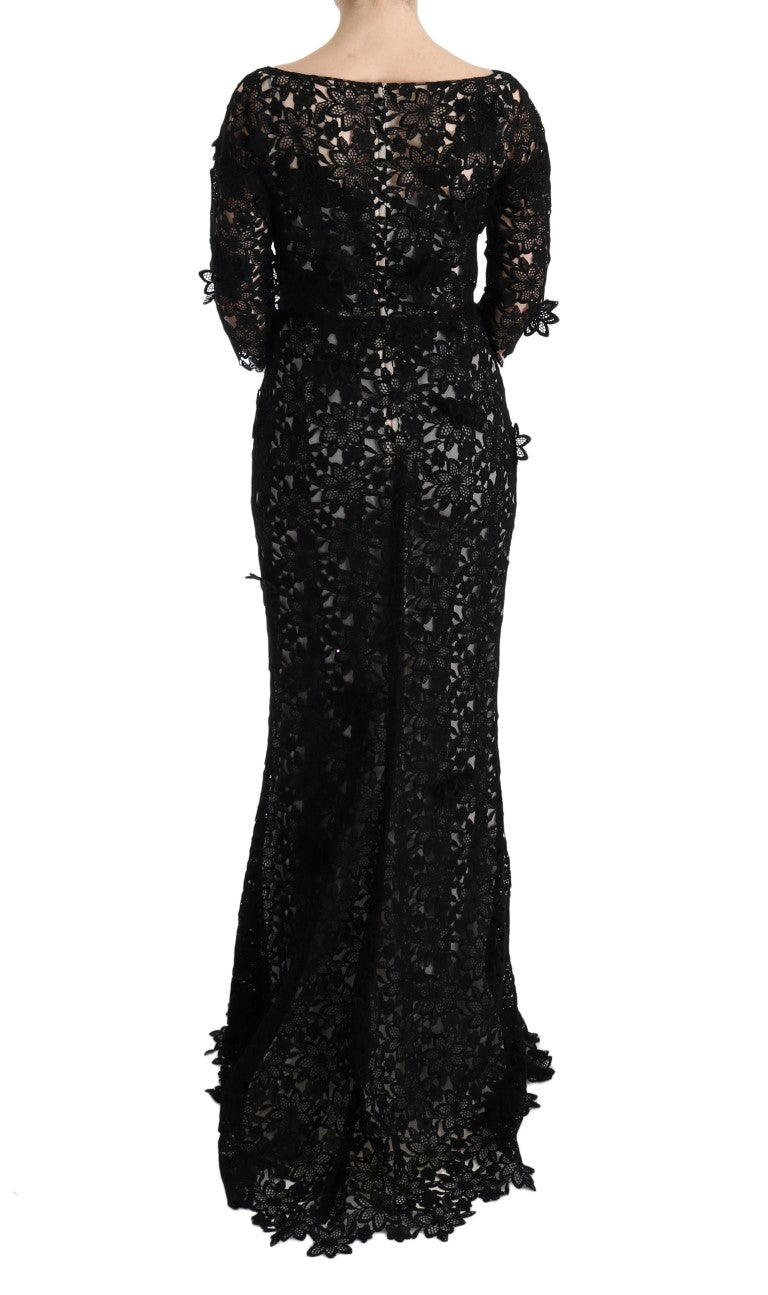 Robe longue Dolce & Gabbana en coton et soie noire avec motif floral, élégante et fluide, portée sur un mannequin.