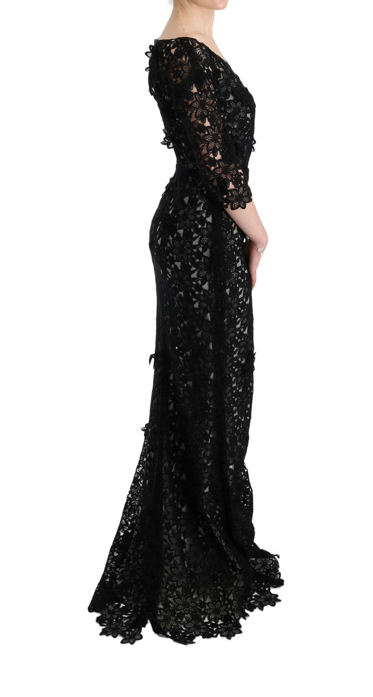 Robe longue en coton et soie noire Dolce & Gabbana avec motif floral, détails élégants et coupe fluide.
