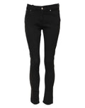 Jeans skinny noirs en coton de Dolce & Gabbana, coupe mi-haute et style denim ajusté visible sur l'image.