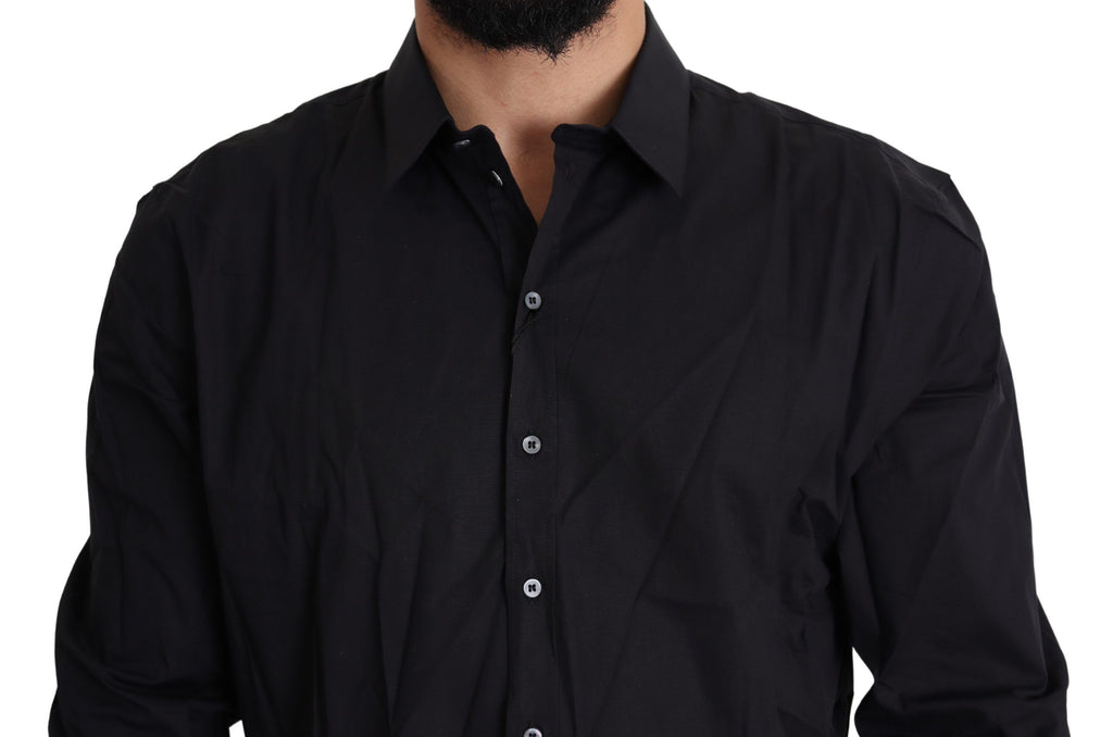 Robe noire en coton stretch Dolce & Gabbana Sicilia avec col classique et coupe élégante, vue de face sur mannequin.