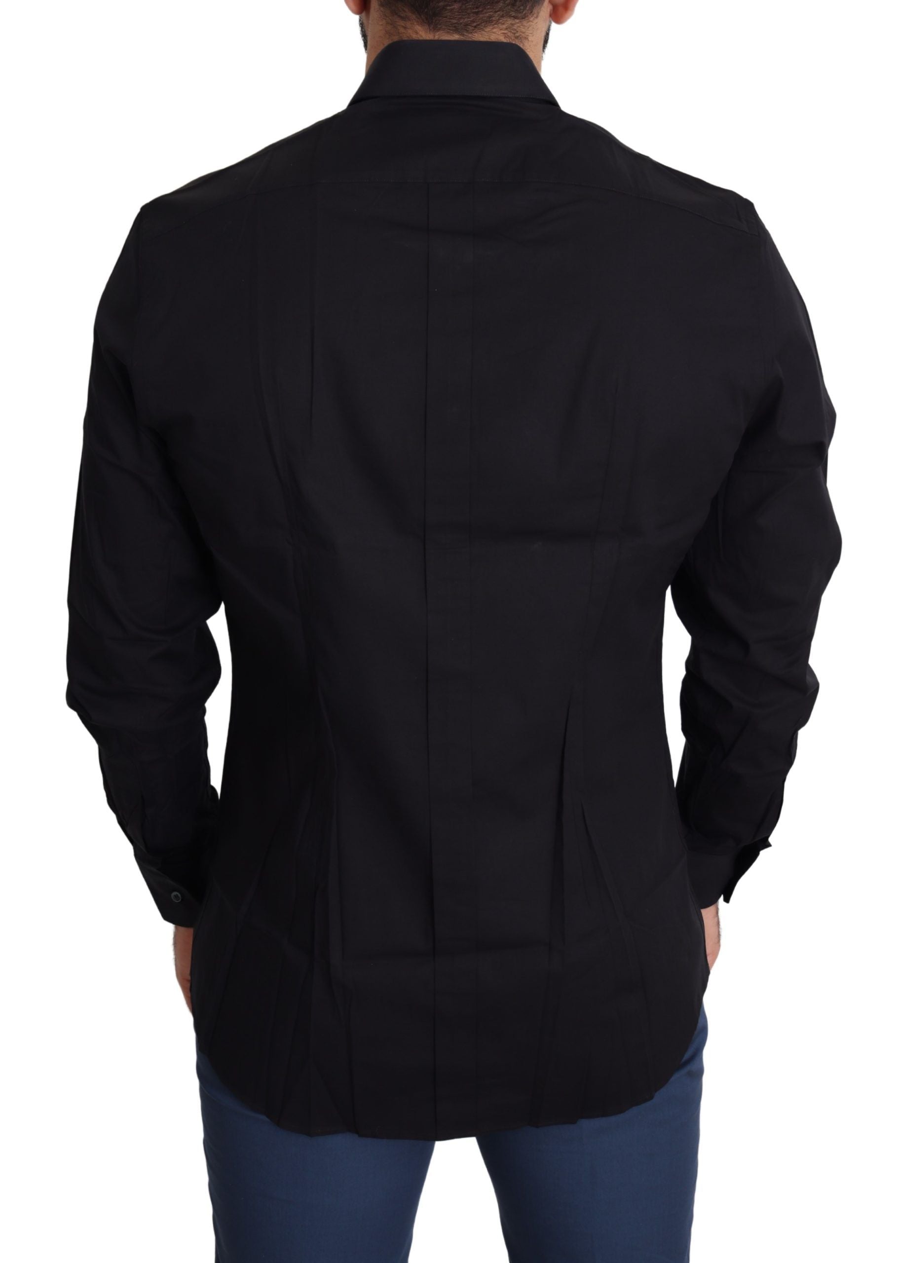 Chemise formelle noire en coton stretch Dolce & Gabbana avec détails dorés, vue de face sur un mannequin.