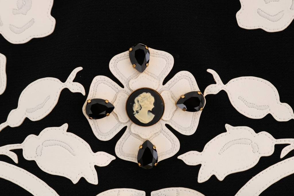 Jupe sirène noire Dolce & Gabbana en tissu avec détails floraux en cristal, coupe élégante et sophistiquée.