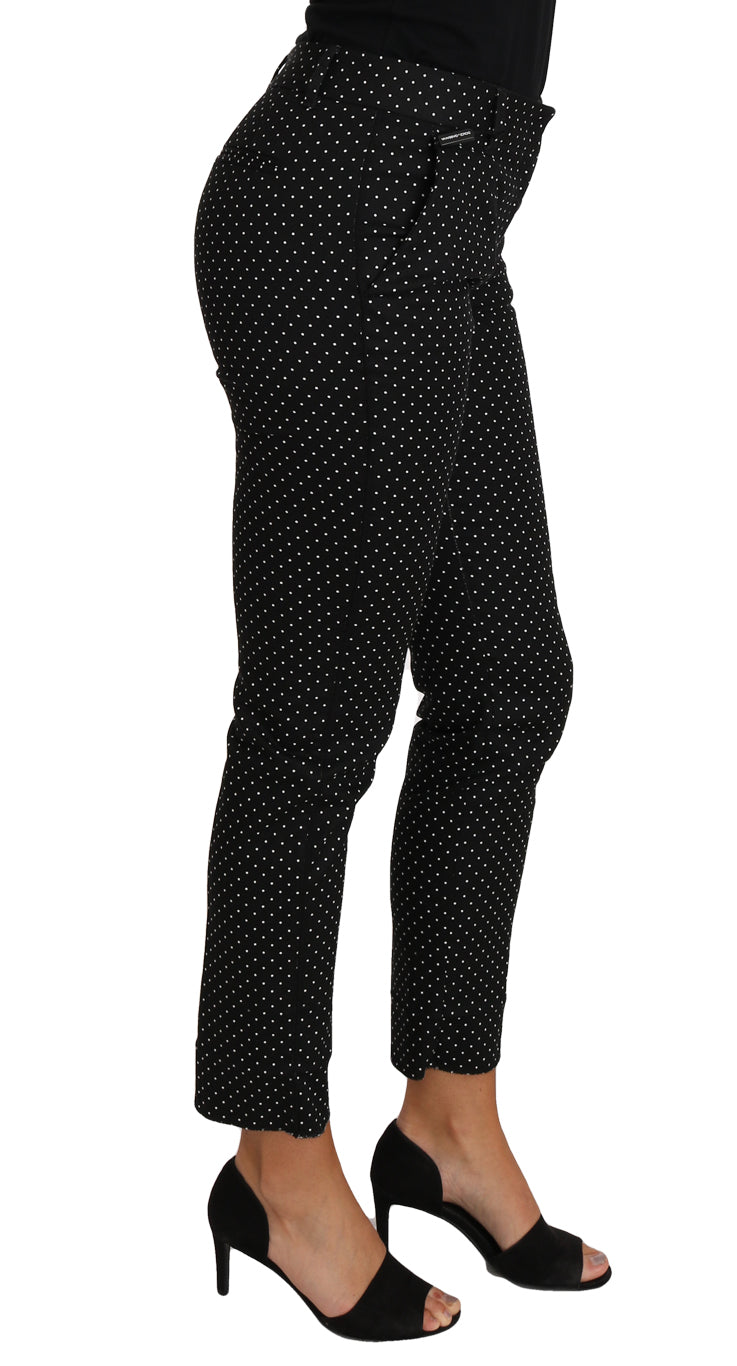 Robe noire Dolce & Gabbana à pois, vêtement élégant avec pantalon droit court et motif à pois.