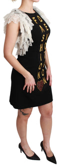 Robe courte noire Dolce & Gabbana Fashion Devotion en tissu élégant, ajustée avec détails raffinés.