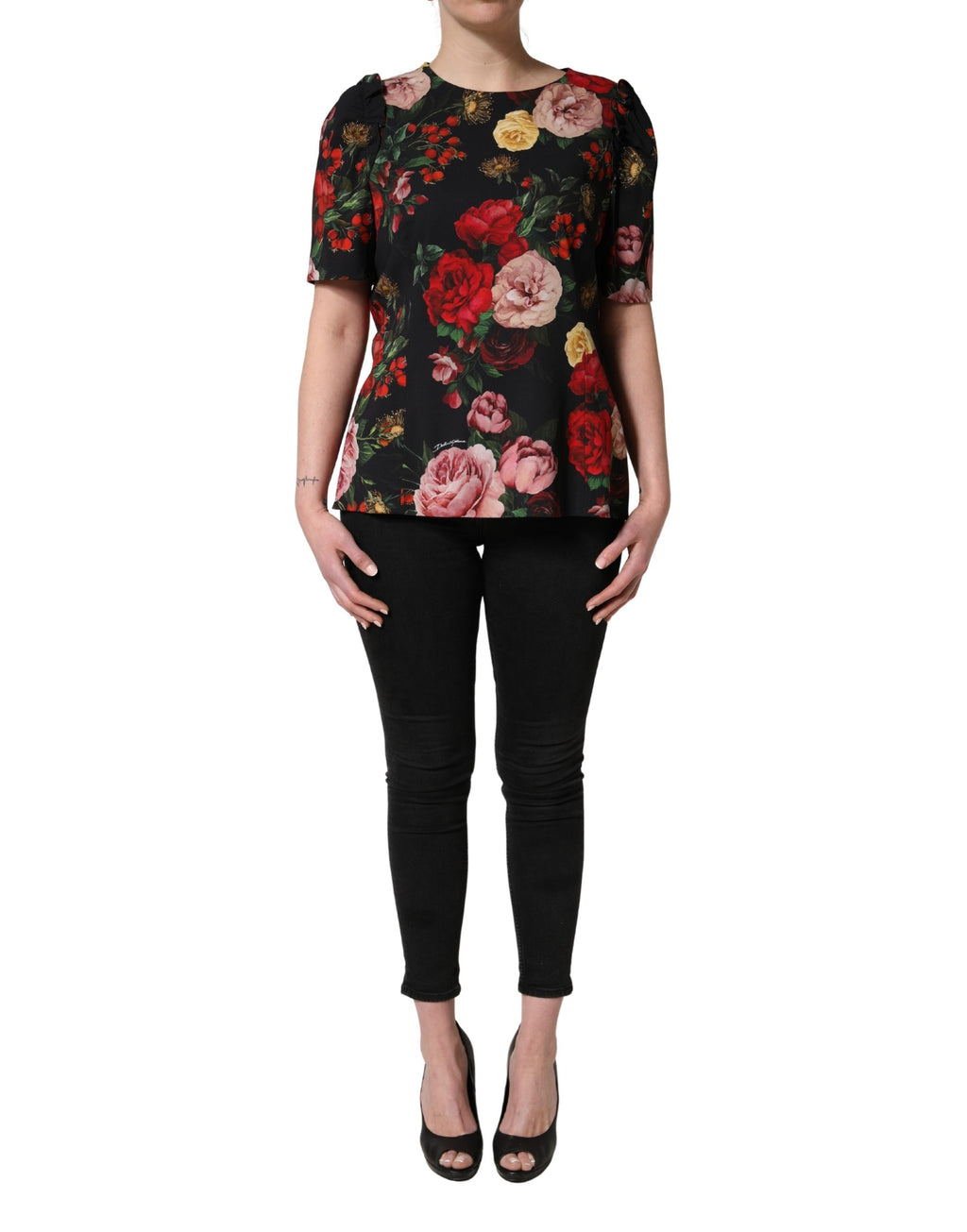 Blouse Dolce & Gabbana en crêpe noir avec détails floraux et volants, élégante et féminine.