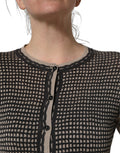 Cardigan Dolce & Gabbana noir en dentelle florale avec boutons, style élégant pour femmes.