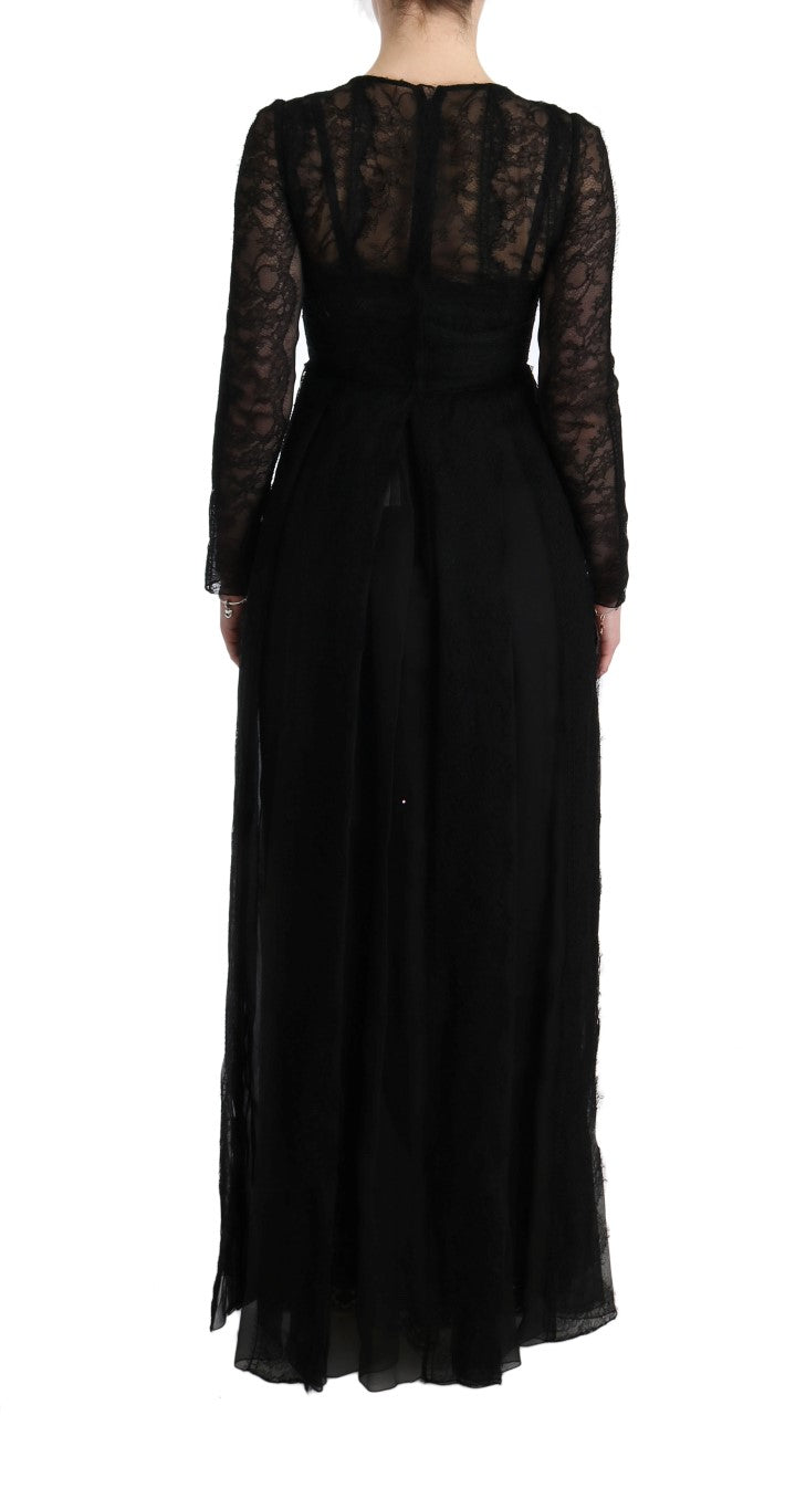 Robe en soie noire à fleurs en dentelle Dolce & Gabbana, coupe droite élégante, détails floraux délicats visible sur l'image.