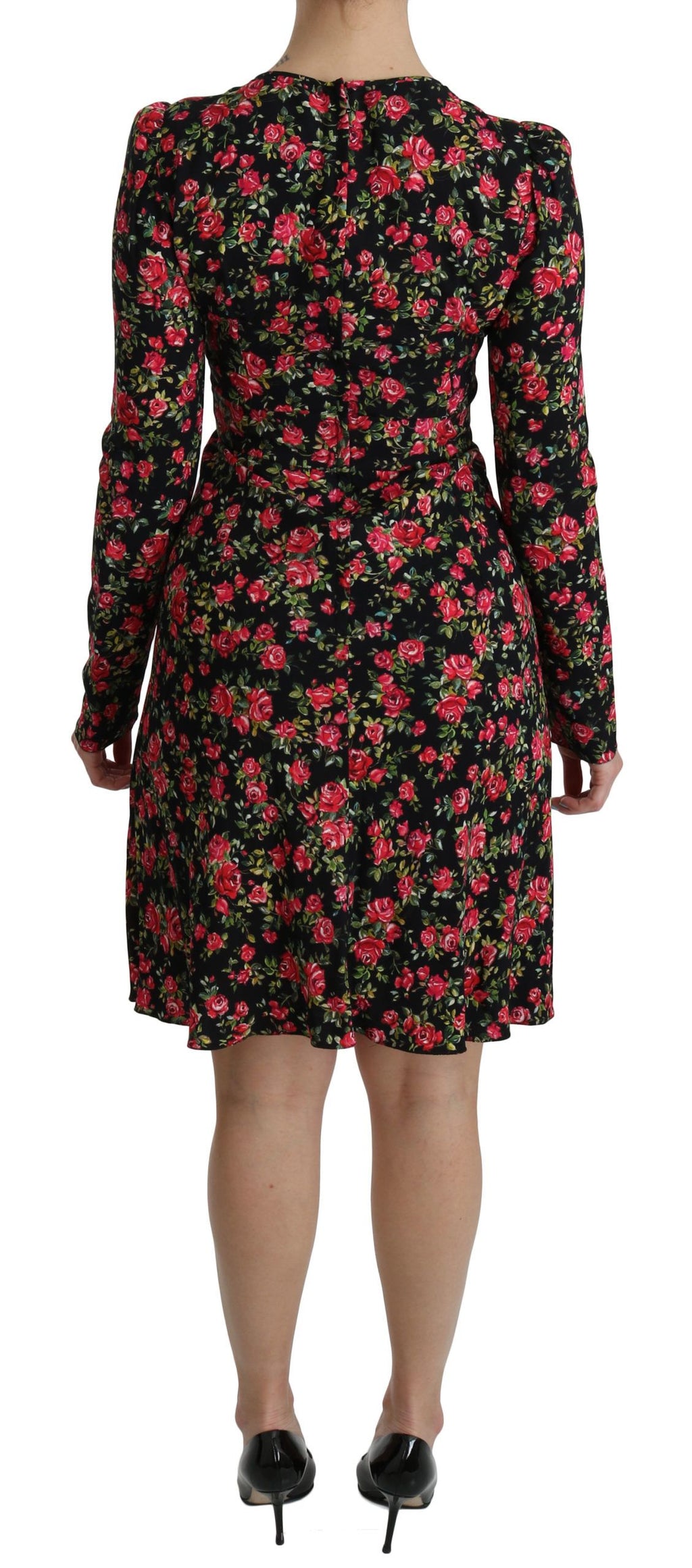 Robe longue noire à fleurs Dolce & Gabbana, manches longues et longueur au genou, élégante et sophistiquée.