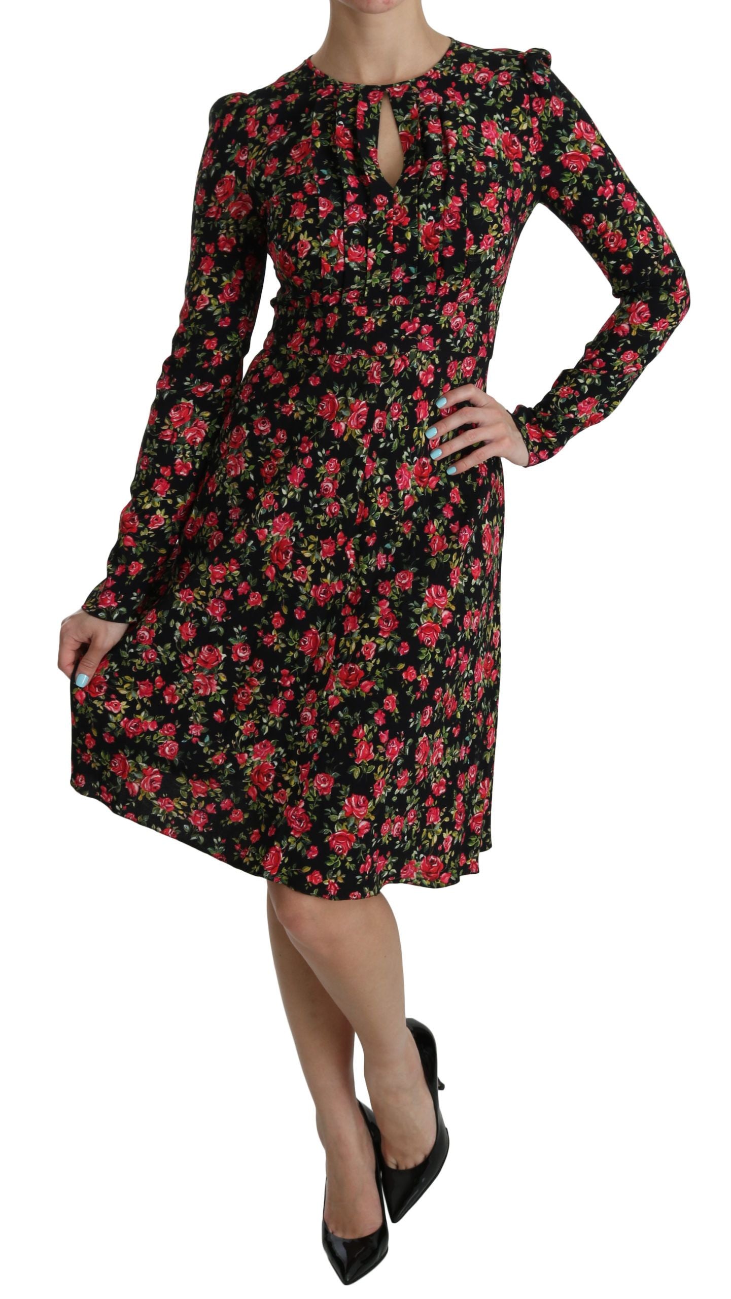 Robe longue noire à fleurs Dolce & Gabbana avec manches longues et longueur au genou, élégante et sophistiquée.