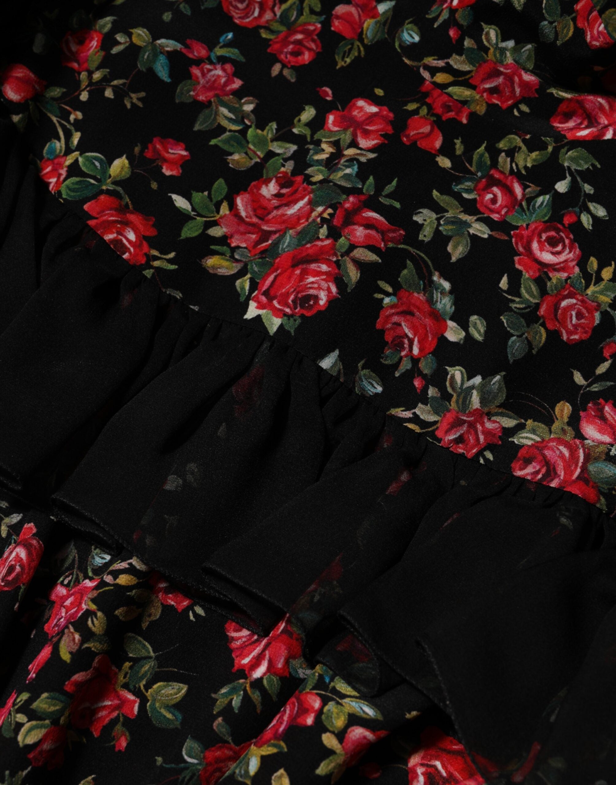 Chemise à manches longues Dolce & Gabbana à imprimé floral noir, style élégant et féminin.