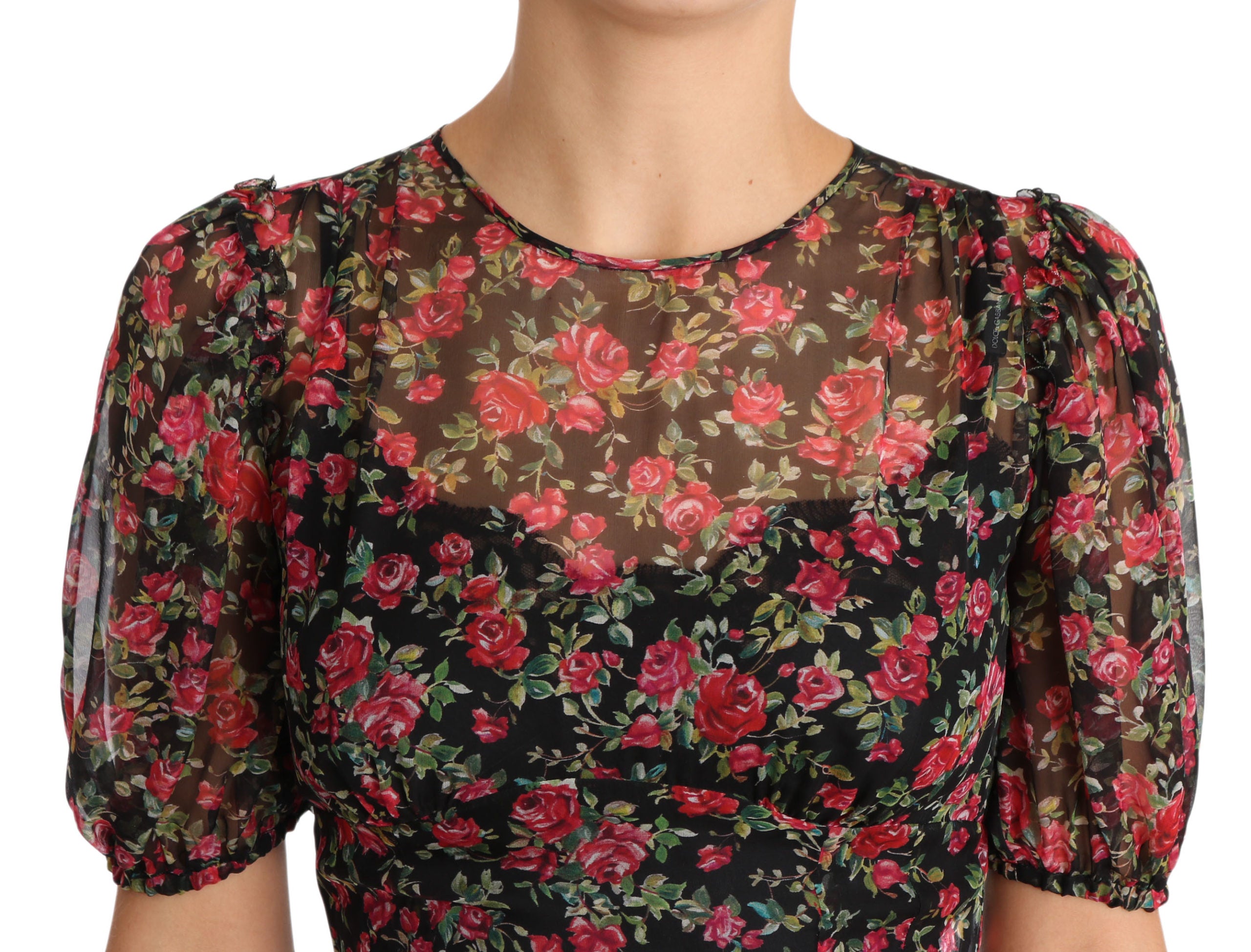 Robe shift noire Dolce & Gabbana avec motif floral de roses, coupe A-line élégante et sophistiquée.