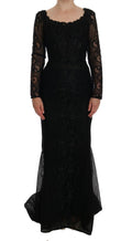 Robe fourreau noire à motifs floraux Dolce & Gabbana, élégante et sophistiquée, portée sur un mannequin.