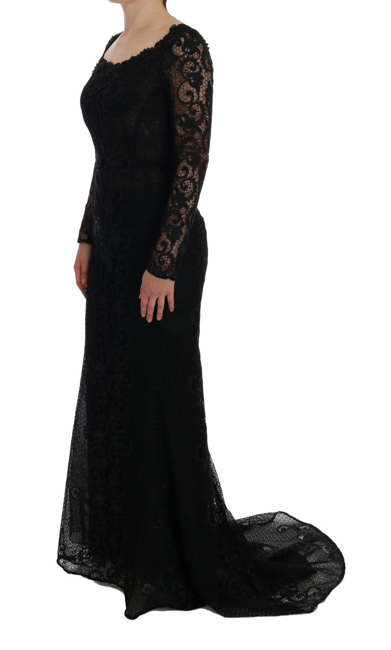 Robe fourreau noire à fleurs de Dolce & Gabbana, élégante et sophistiquée, avec motif floral visible sur la robe.