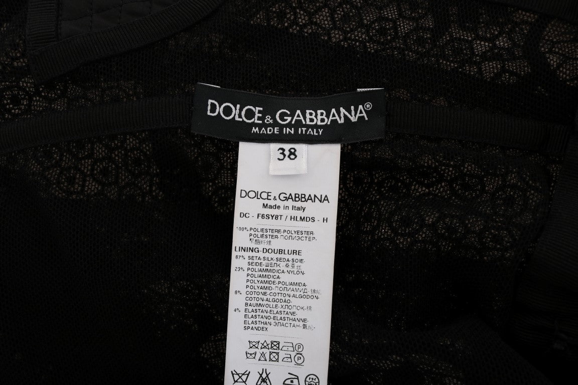 Robe fourreau noire Dolce & Gabbana à motifs floraux, élégante et ajustée, portée sur un mannequin.