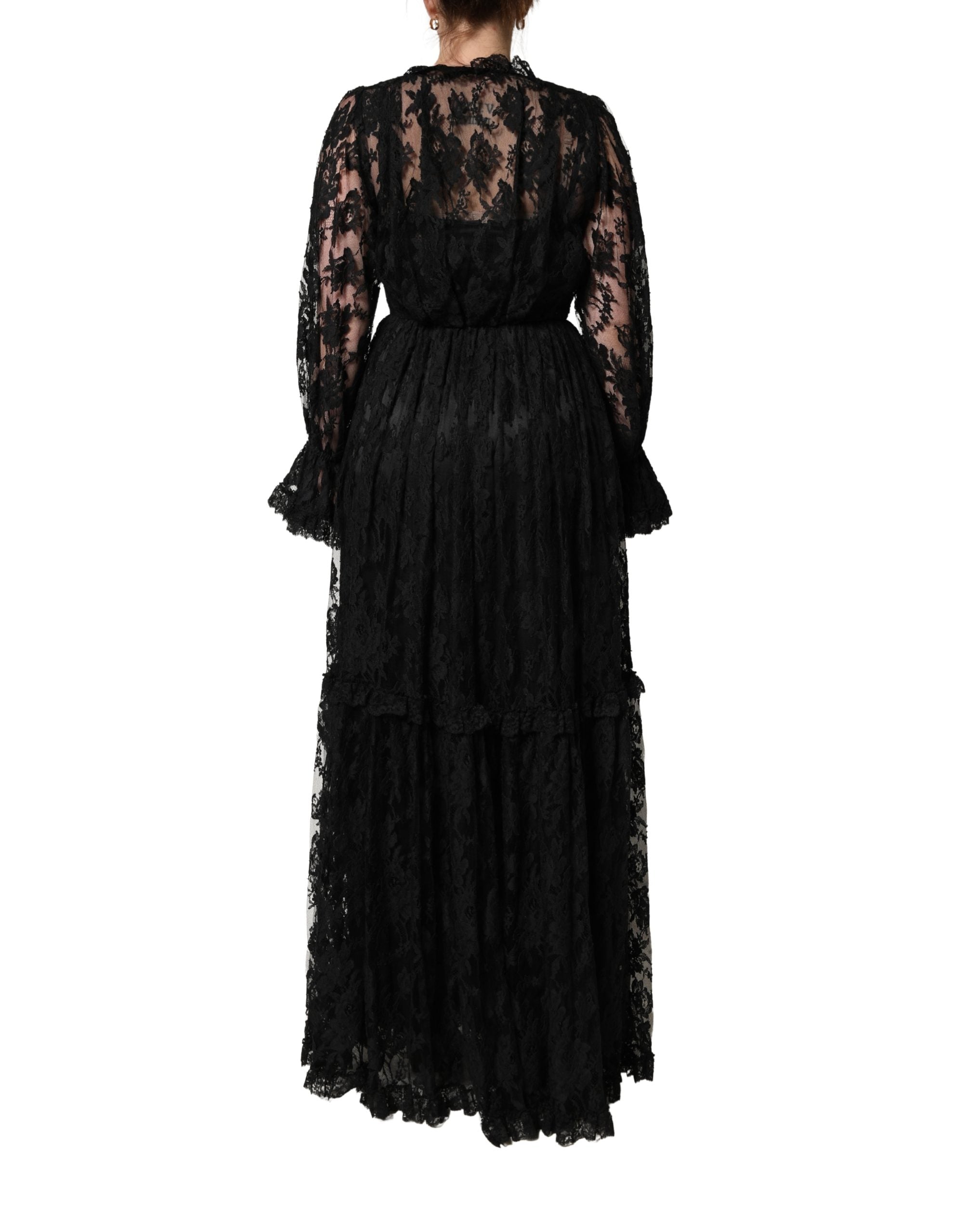 Robe longue de soirée en dentelle noire Dolce & Gabbana avec coupe évasée et détails élégants, parfaite pour une occasion spéciale.