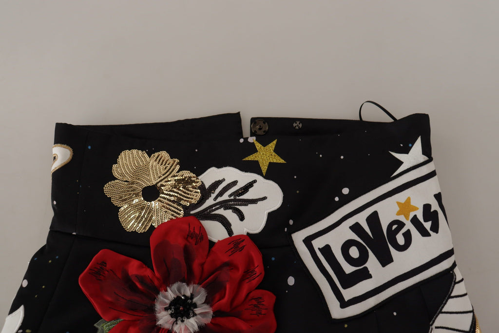Jupe en piano noire Dolce & Gabbana Love Clock avec sequins brillants, élégante et glamour, vue de face.