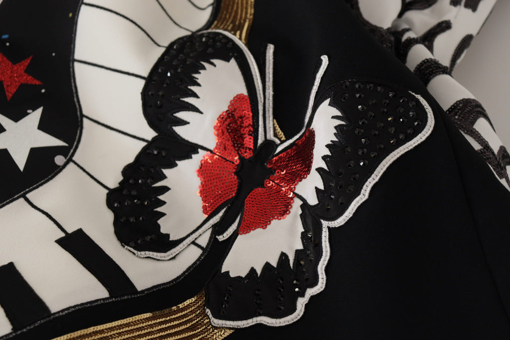 Jupe piano noire Dolce & Gabbana avec sequins Love Clock, élégante et brillante, sur fond blanc.